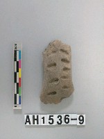 藏品(灰色夾砂陶把殘件)的圖片